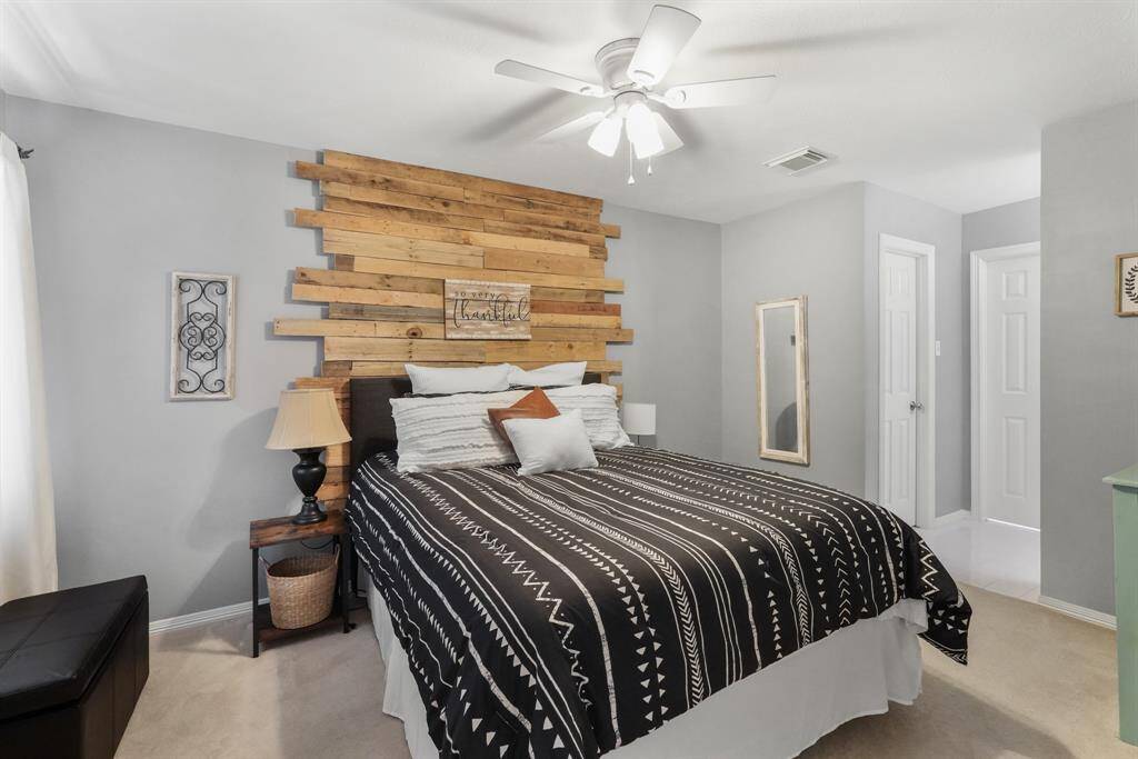 Bedroom 4 is perfectly designed as a guest suite as it opens to a private bath. This photo is staged for photo purpose.