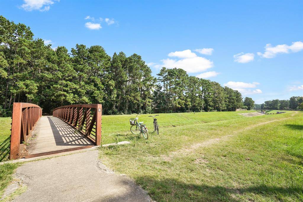 Take a walk over the bridge where you can relax under the shade of the trees that surround the area.