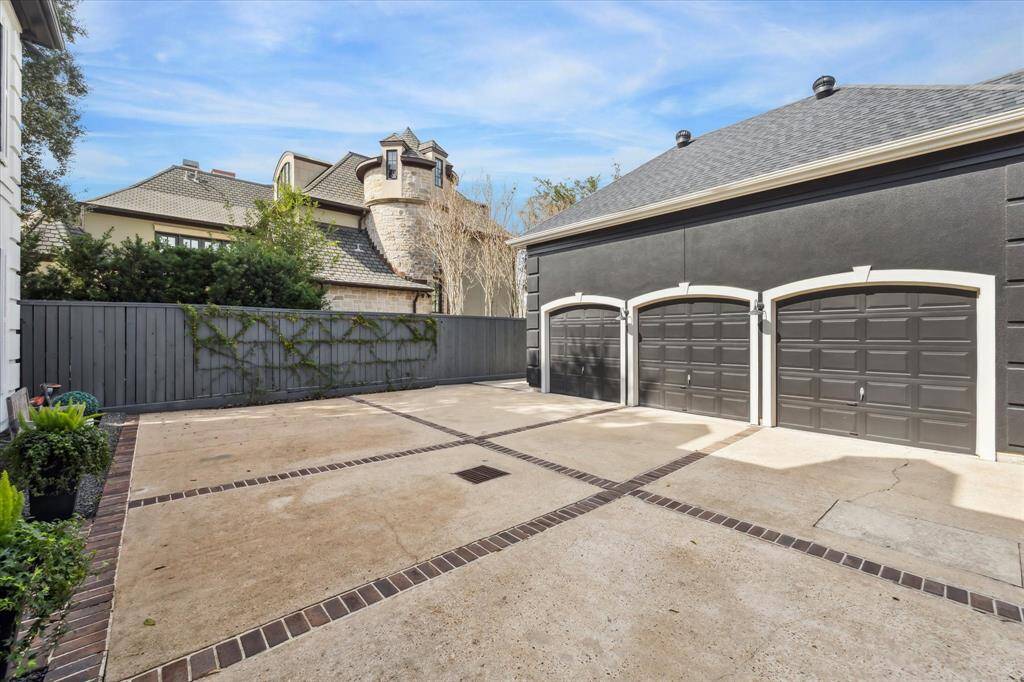 An oversized motor court and 3-car garage offer ample storage and parking, with the added potential for a spacious 2-bedroom guest quarters above, perfect for visitors or additional living space.