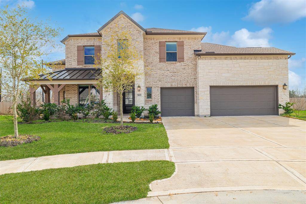 Elegant 2-sty Westin built home with brick and stone elevation located on an oversized cul-de-sac lot.