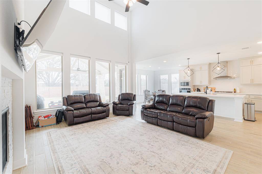 The family room is open to the kitchen and breakfast room.