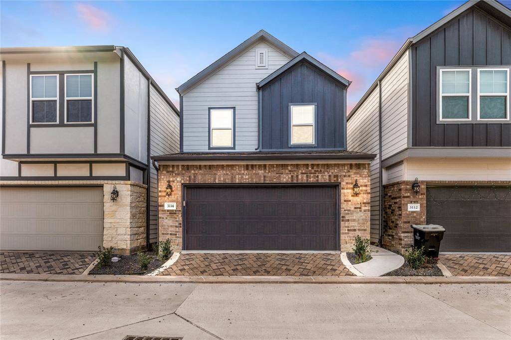 Welcome home to 3114 Moonlit Mesa Dr. on a quiet street in Dunvale Village and zoned to HISD! This stunning home has lovely curb appeal, stone/brick elevation, dark stained front door with glass detailing, traditional style, beautiful outdoor lanterns and a double wide driveway!