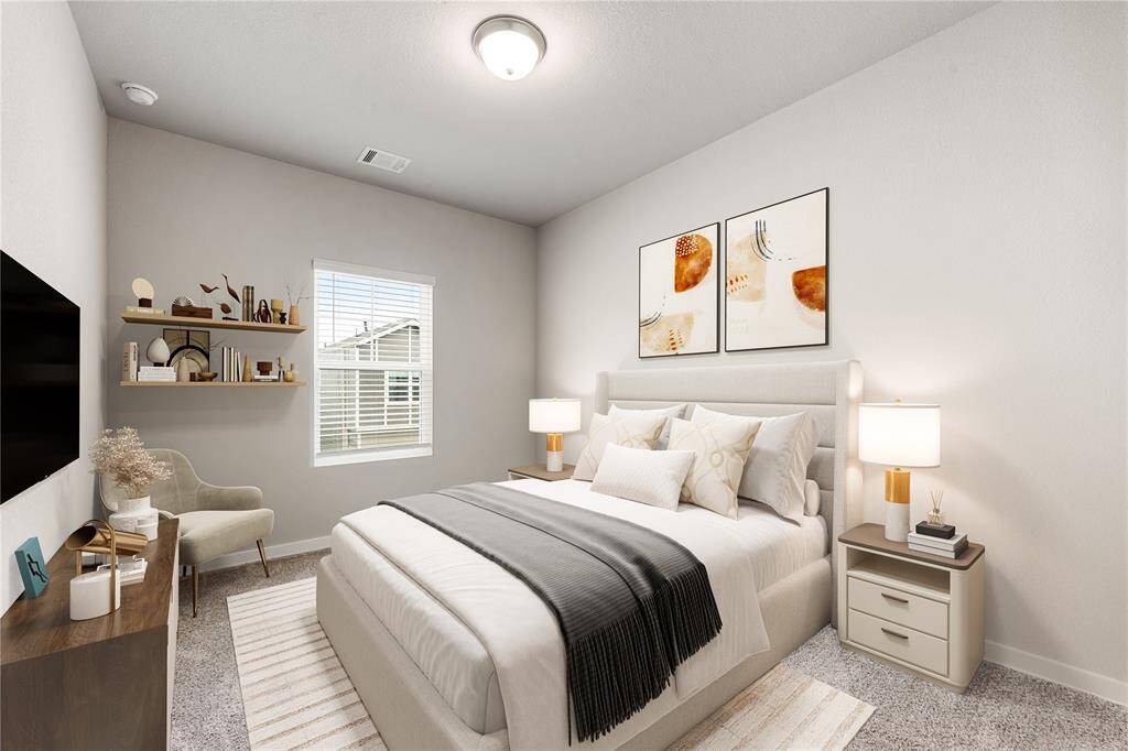 Secondary bedroom great for use as an in-law suite or guest suite features high ceilings, lovely modern ceiling fan, custom paint, plush carpet, space for seating area, direct access to the secondary bathroom and large window with plenty of natural light. *Virtually Staged