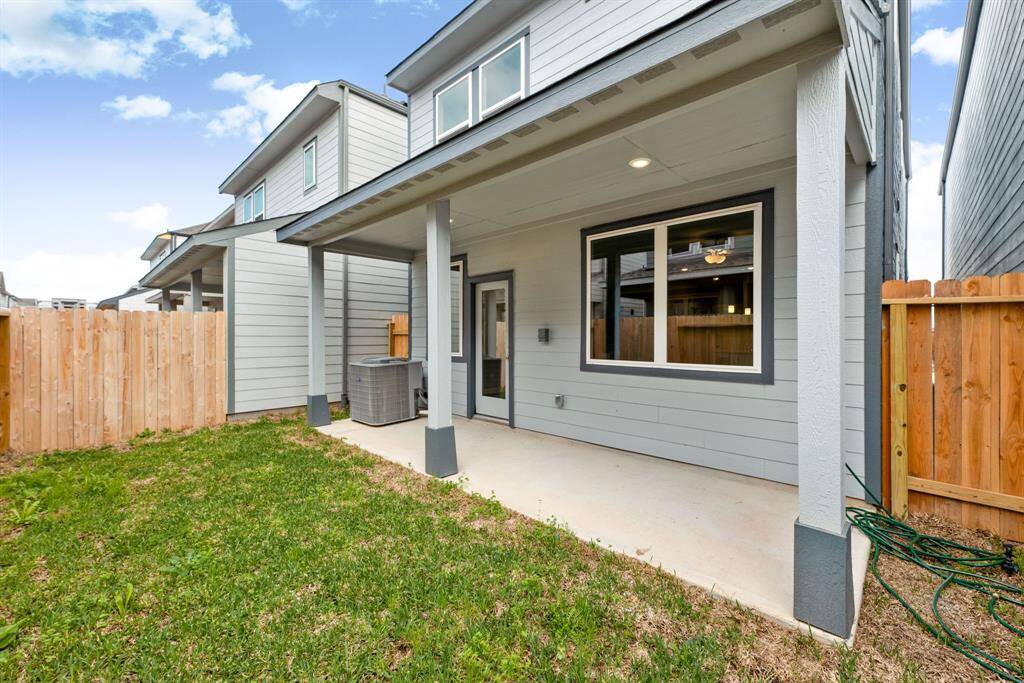 An entertainer’s dream—this spacious covered patio and neatly fenced yard offer plenty of room to unwind and make lasting memories.