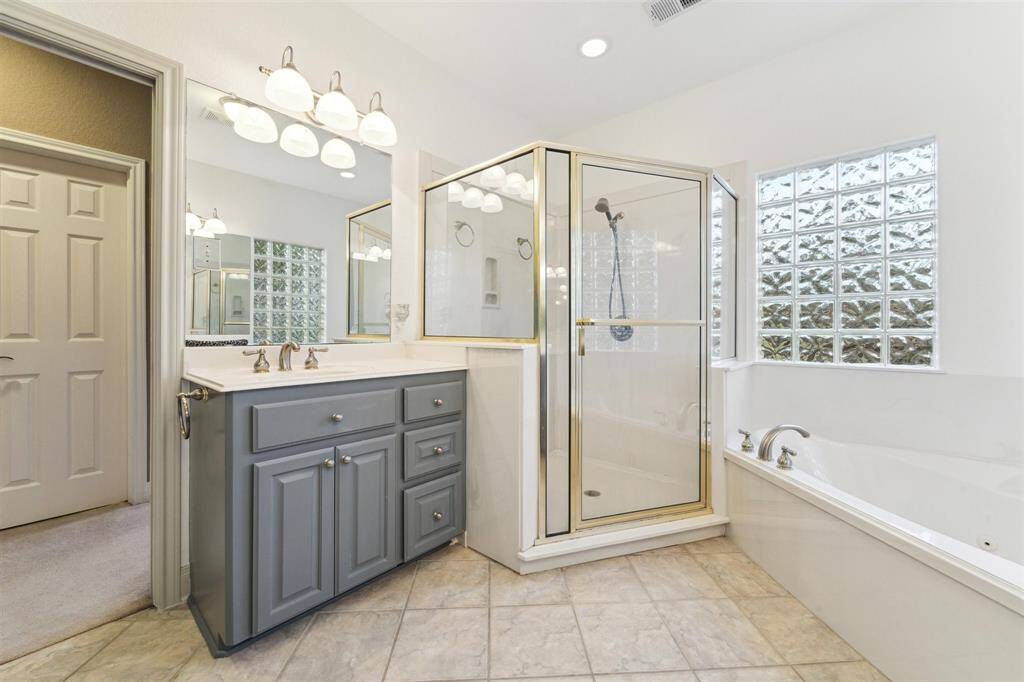 From this view you can see the door to the large walk-in closet in the primary suite.