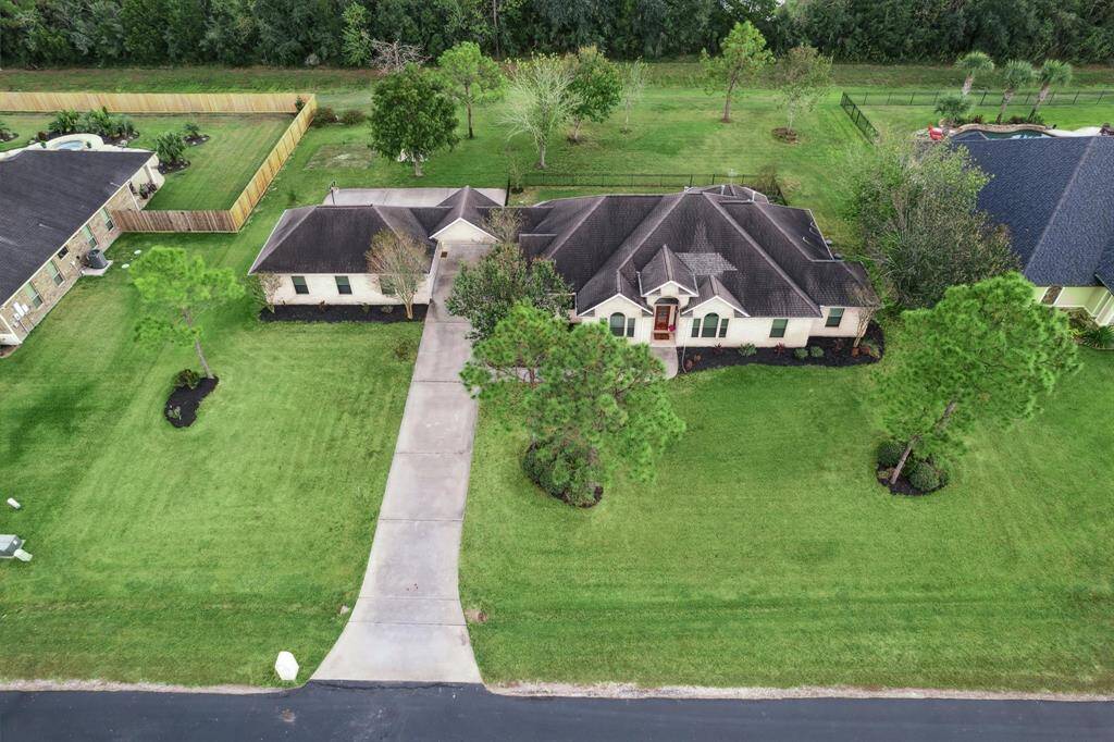 The property backs up to a tree line further providing privacy.