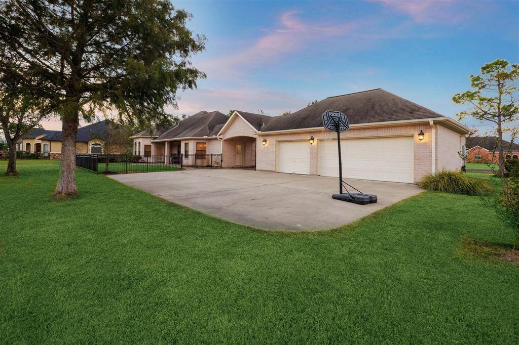 Large yard area provides lots of possibilities. The yard is partially fenced but the property extends beyond that.
