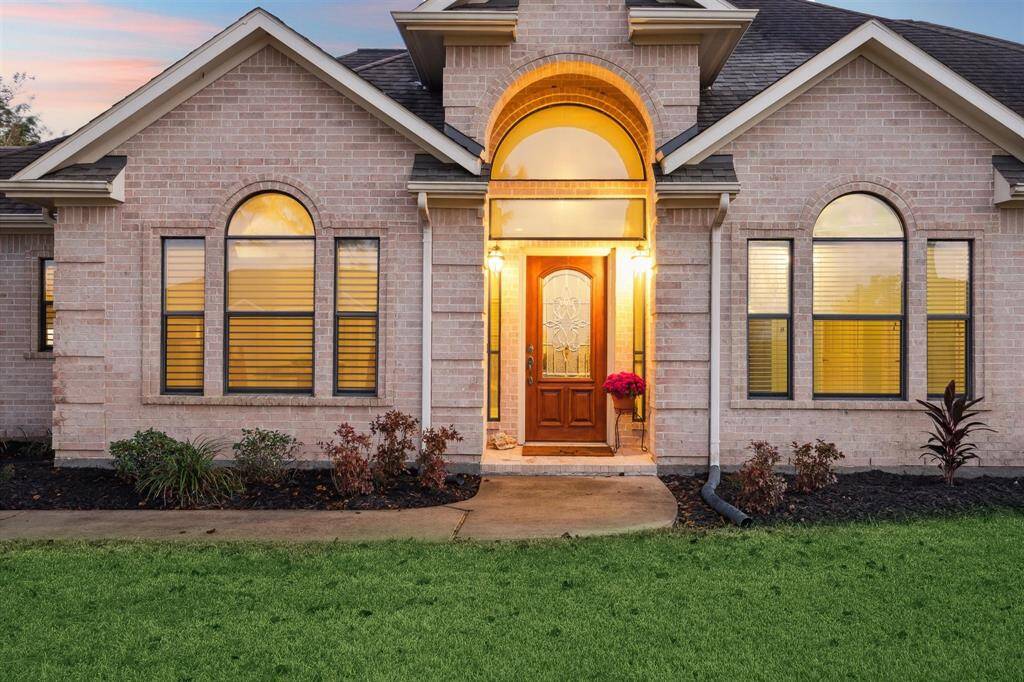 Enter through the front door through the beautiful arched entryway.