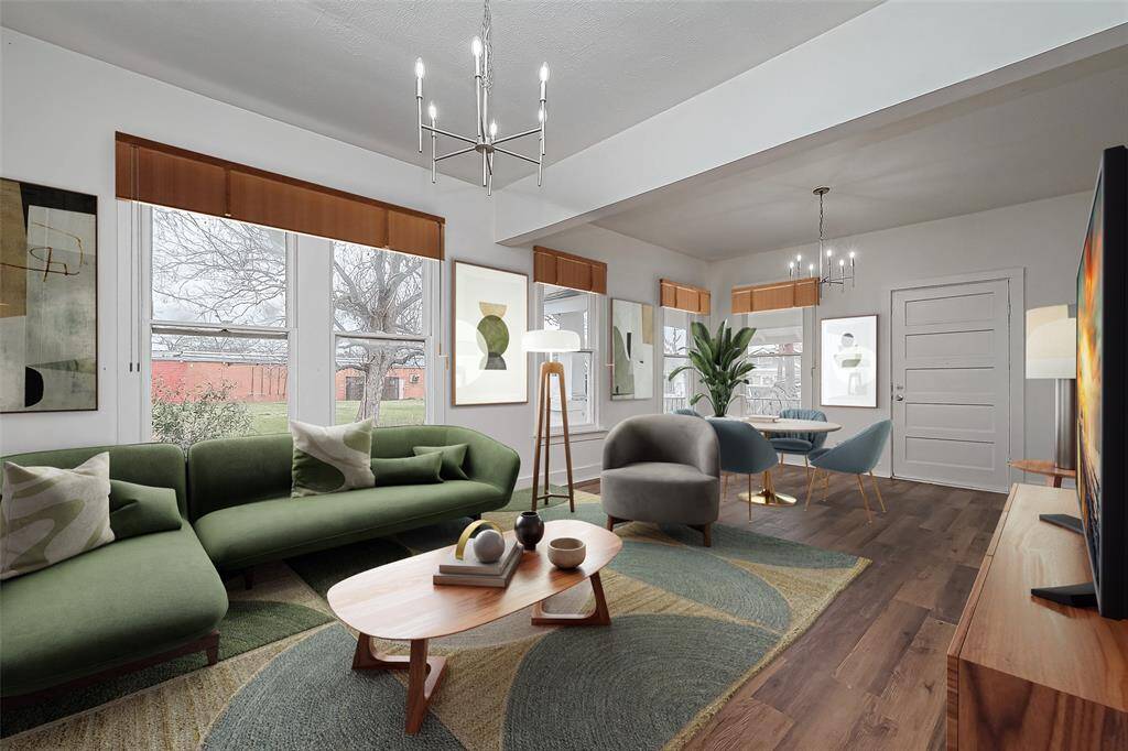 This virtually staged living room brings the space to life, showcasing its potential for comfortable and stylish living. A thoughtfully arranged seating area highlights the room’s open layout, while accent décor illustrates how the space can be both welcoming and practical.
