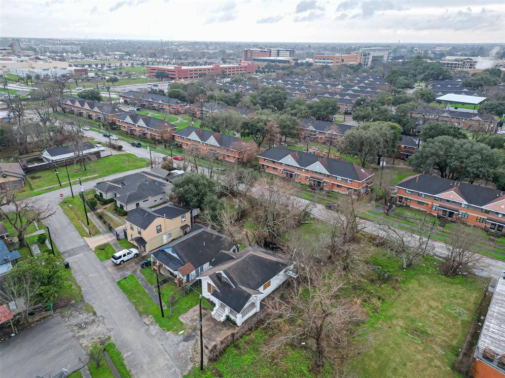 A closer aerial perspective showcases the property within its neighborhood.