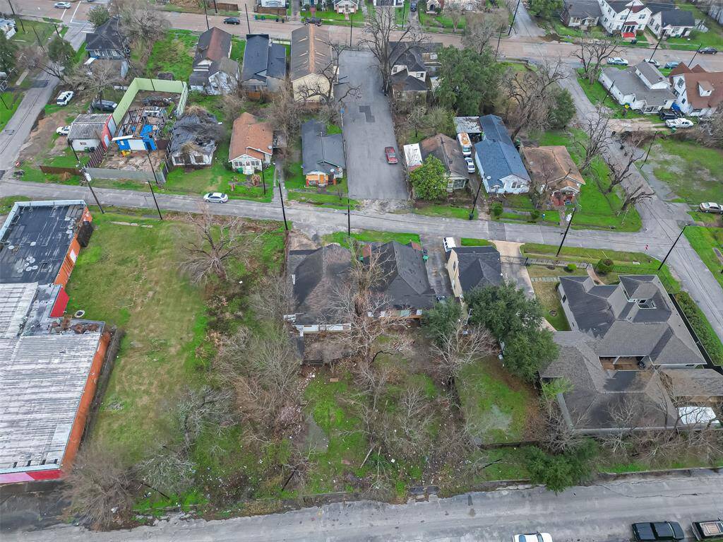 This wide aerial shot showcases the property in context with the surrounding area.