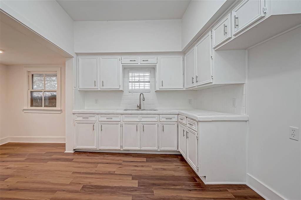 The kitchen’s layout is designed for both style and efficiency, with every element thoughtfully placed.