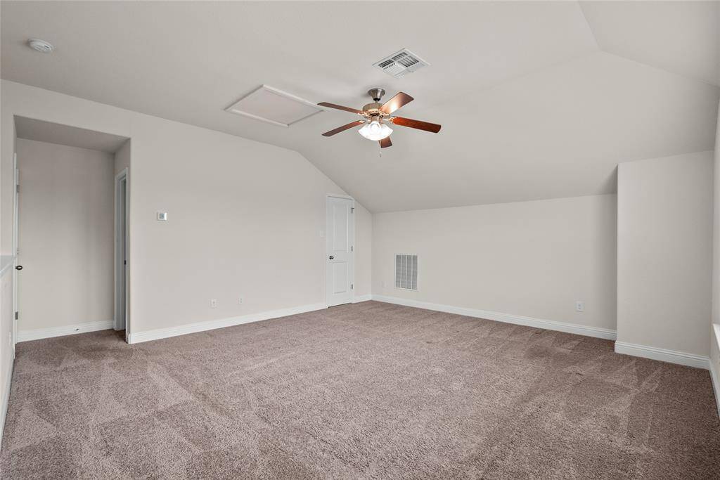 The upstairs 5th bedroom/Media room with a huge walk in closet and its own full bathroom
