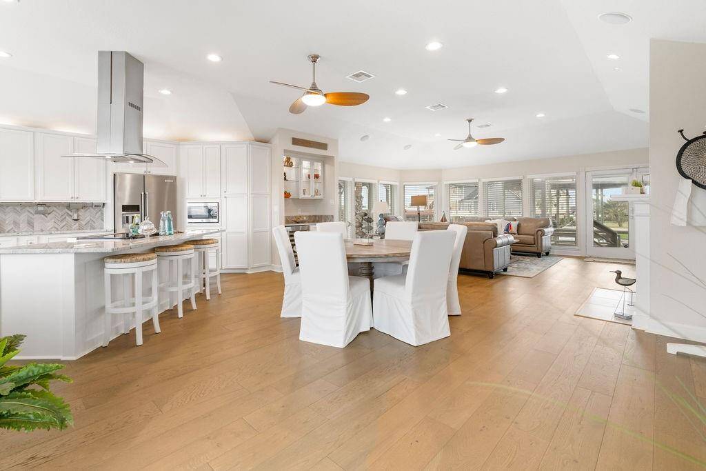 Open Concept Kitchen, living and dining area, with gorgeous hardwood floors.
