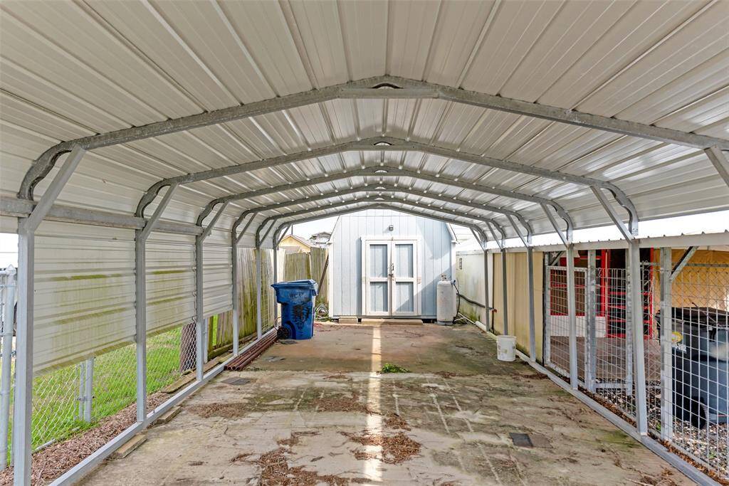 Additional covered area for additional parking with additional storage building
