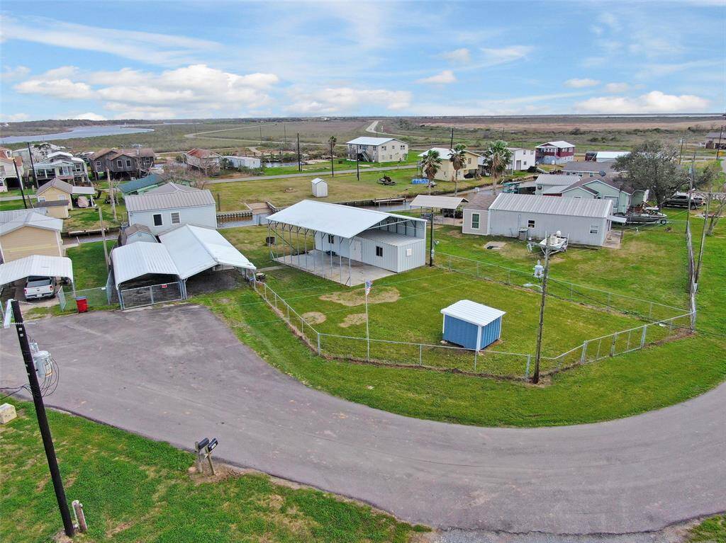 Arial of the House with carports and extra large cover for RV parking and storage