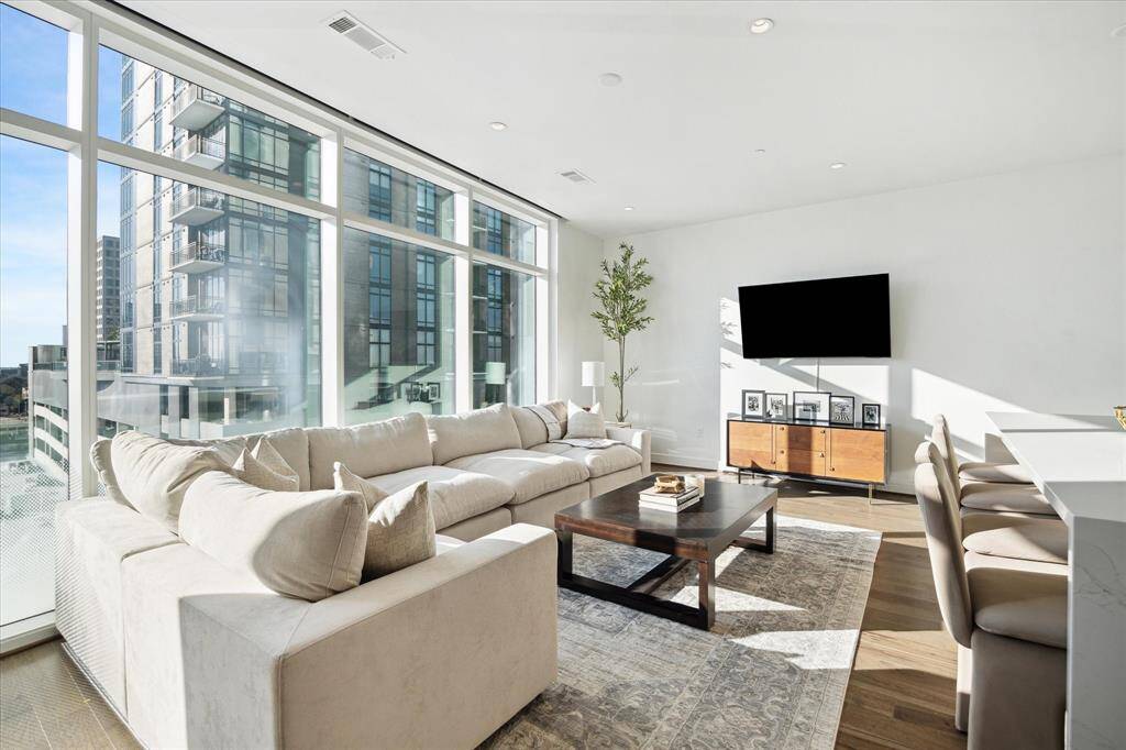 With floor to ceiling windows, you have the option to see the city, or have the shades drawn.