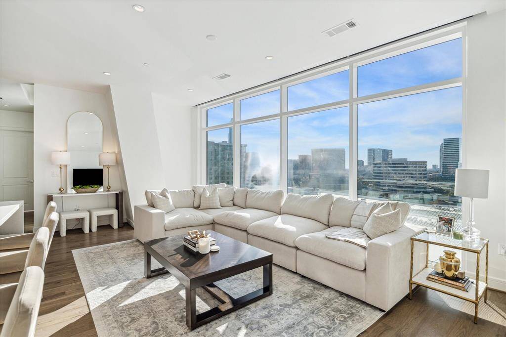 The wall of windows flood the space with light for a bright and airy feel.