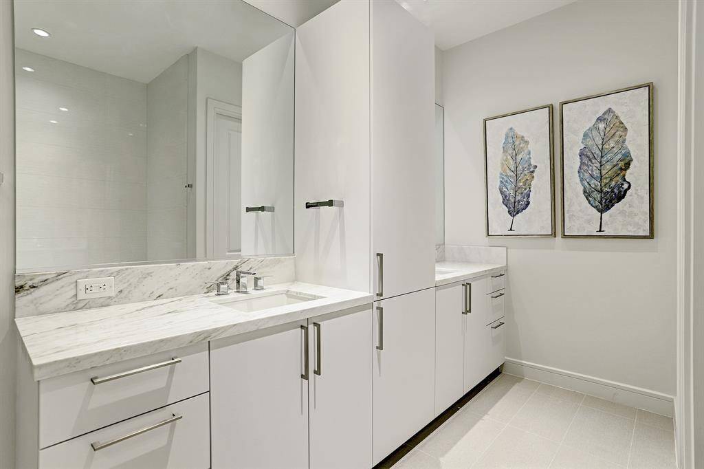 The spa like master en suite features double vanities with great storage.