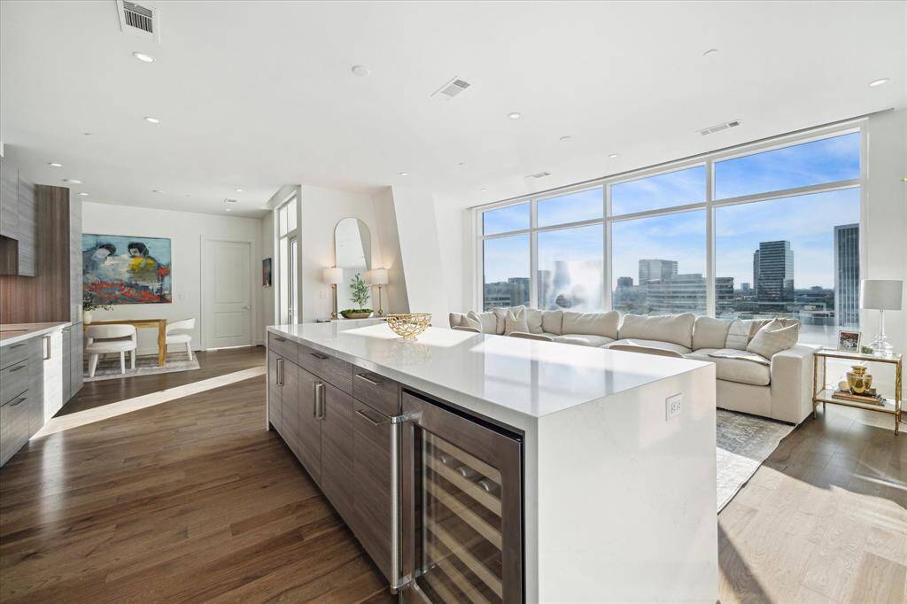 Amazing views from the kitchen and living room! There is also a built-in wine refrigerator in the island.