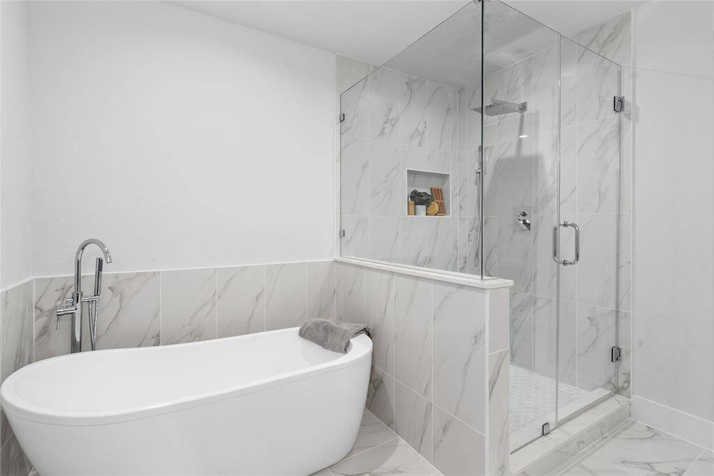Soak in your freestanding tub after a long day at work