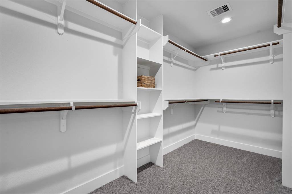 Primary Bedroom Closet is so big you are going to need to buy more clothes!