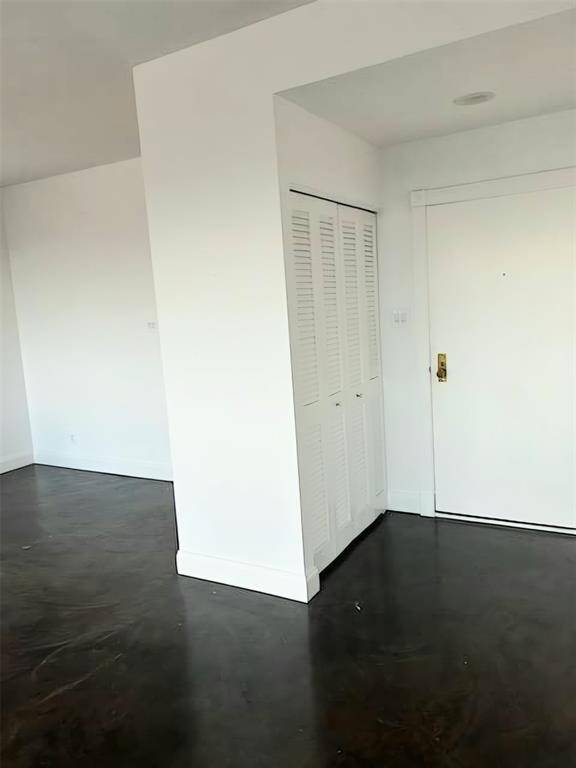 LOOKING TO FRONT DOOR FROM LIVING
