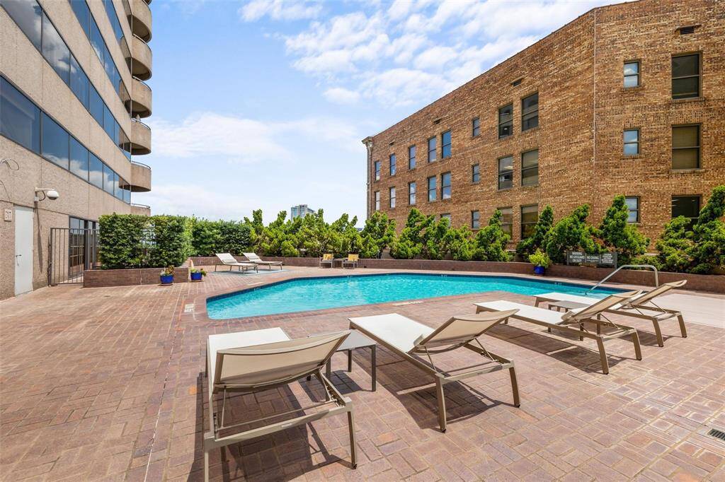 YOU CAN ENJOY THIS BEAUTIFUL POOL WITH GREEN AREA, WHIRLPOOL, OUTDOOR SEATING AND GREEN AREAS