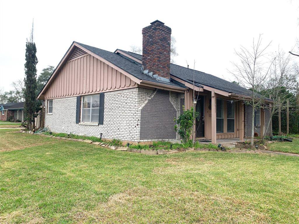 Side view of house. Detached garage on side of house which is located on Waycross street.