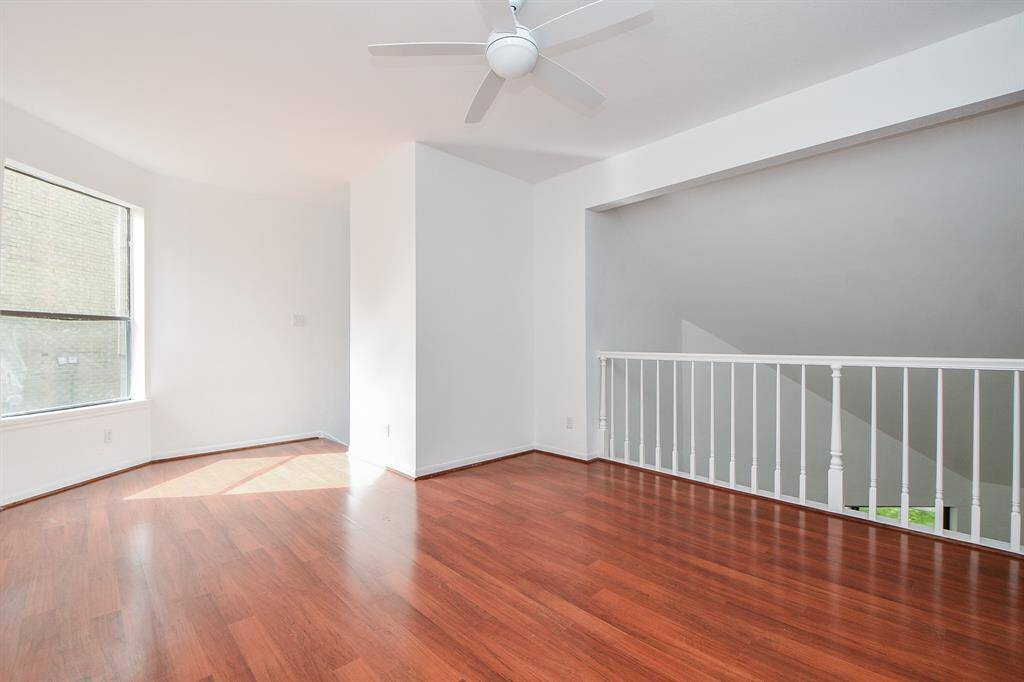 More warm sun fills this portion of the 2nd floor 'game room", overlooking the beautiful living space, below.
