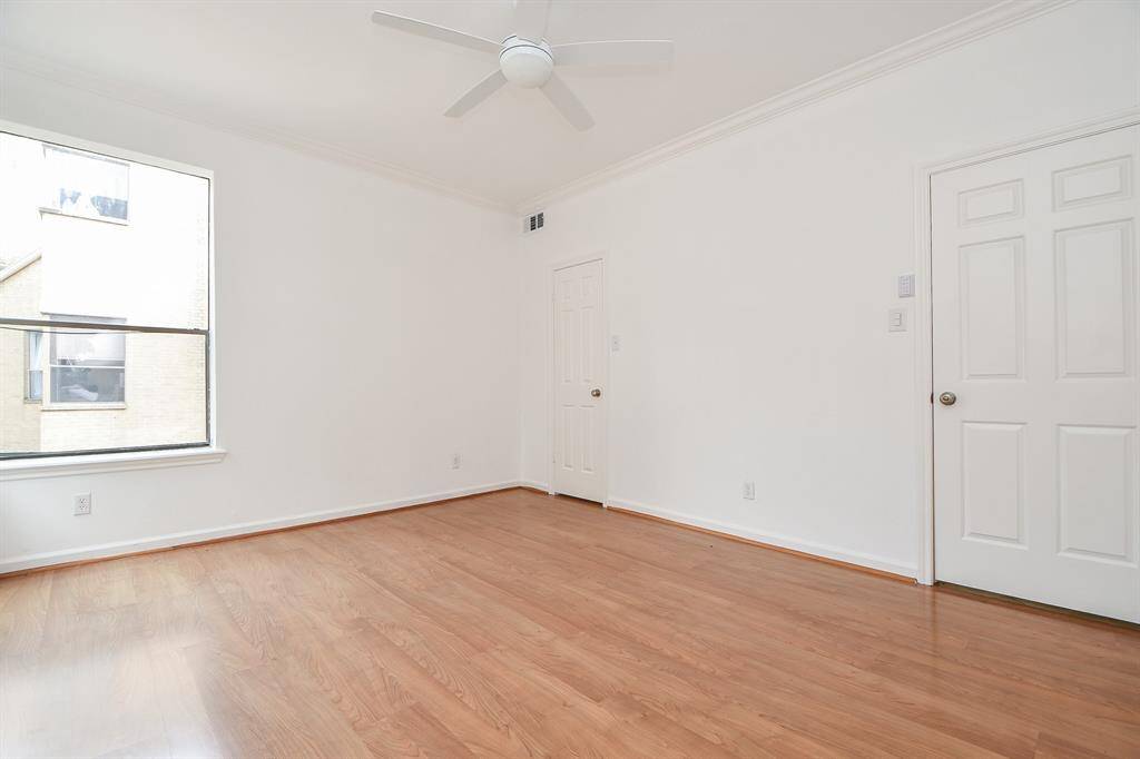 Think of this view of the building lobby as a distinct brick and green place to call home.