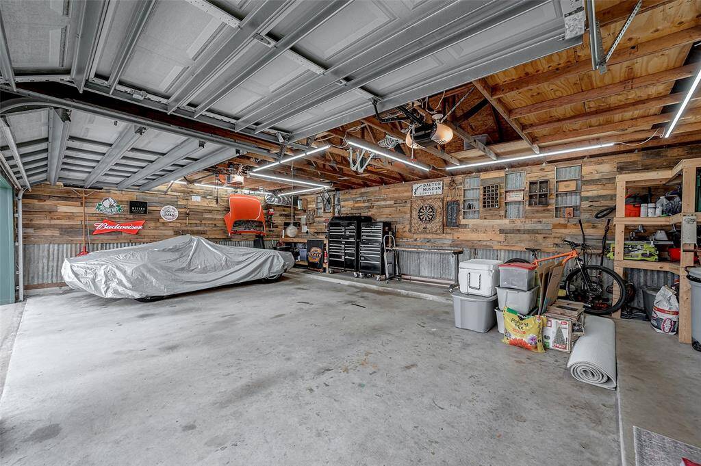 Garage with character that could be a man cave