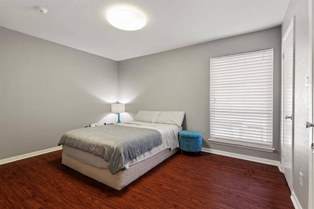 Bedroom 2 is also located upstairs and has its own bathroom and large closet space.