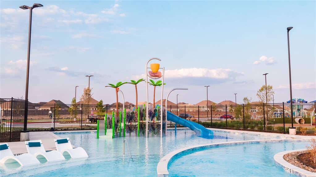Lounge nearby while the kids play at the water playground.