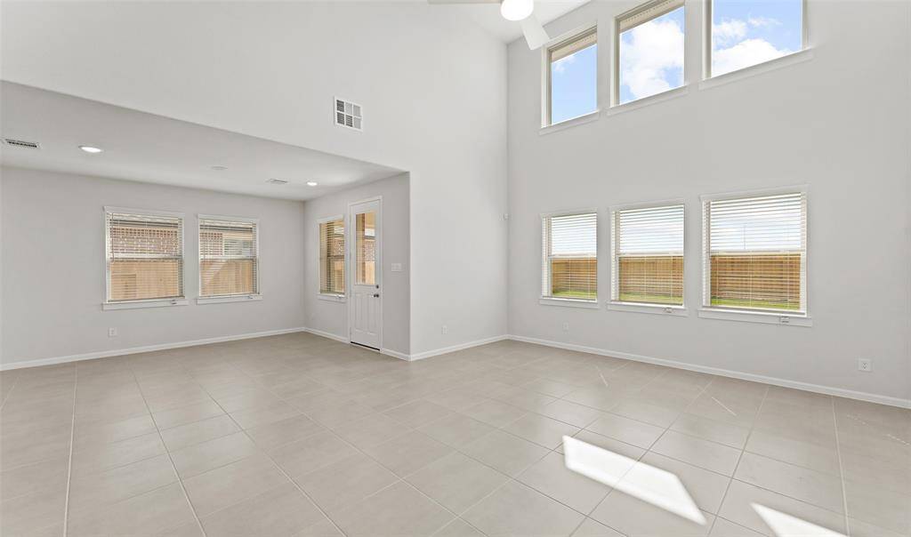 Impressive great room and cozy dining area (*Photo not of actual home and used for illustration purposes only.)