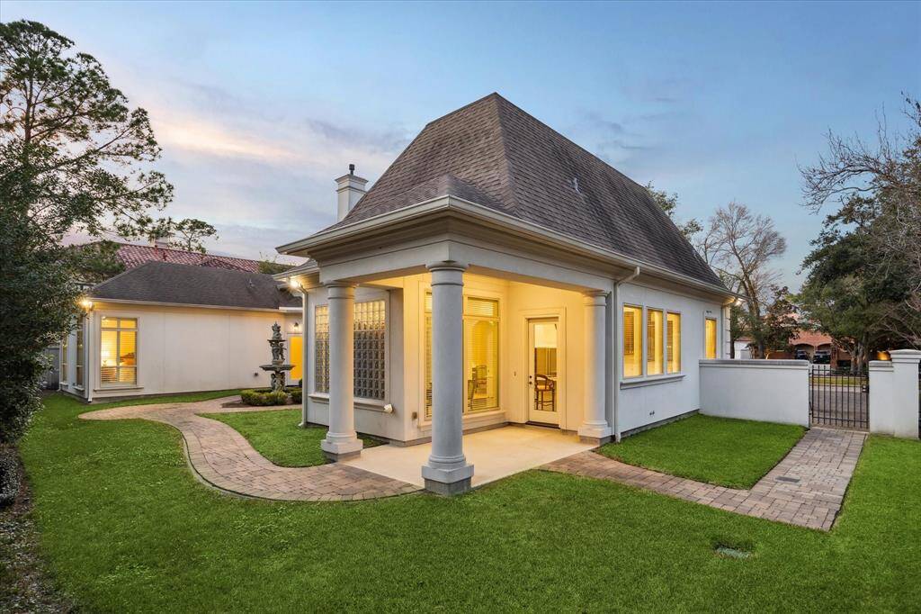 Just off the Kitchen and Breakfast Room is a covered PATIO - just the right size for a small table and chairs to enjoy a morning cup of coffee, a quick lunch or wine celebration at the end of the day.
