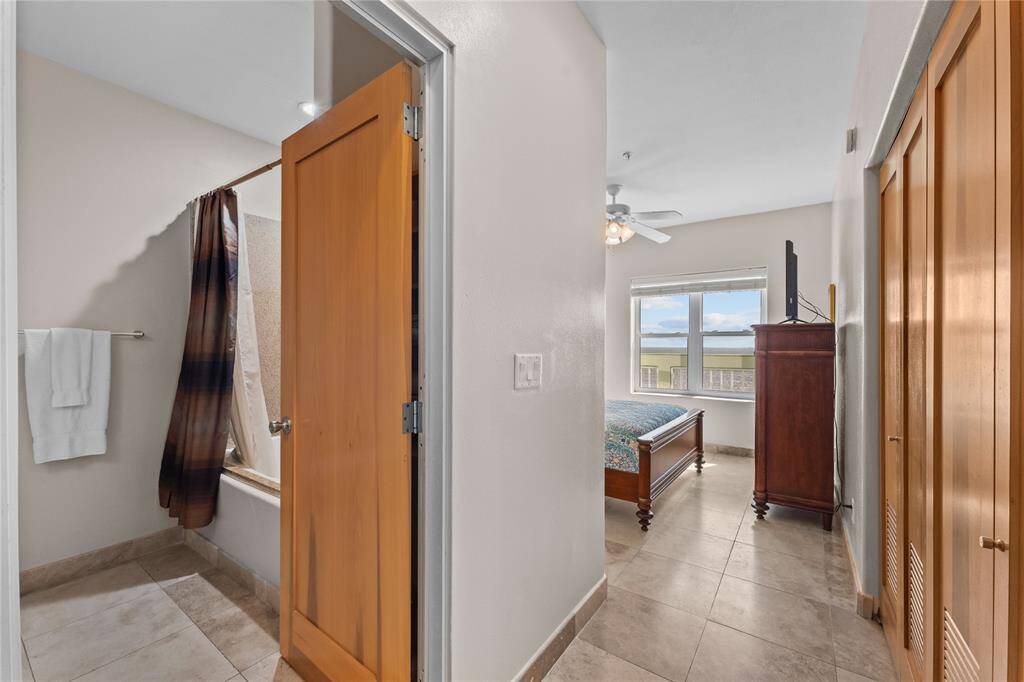 Entering primary bedroom with en-suite bath