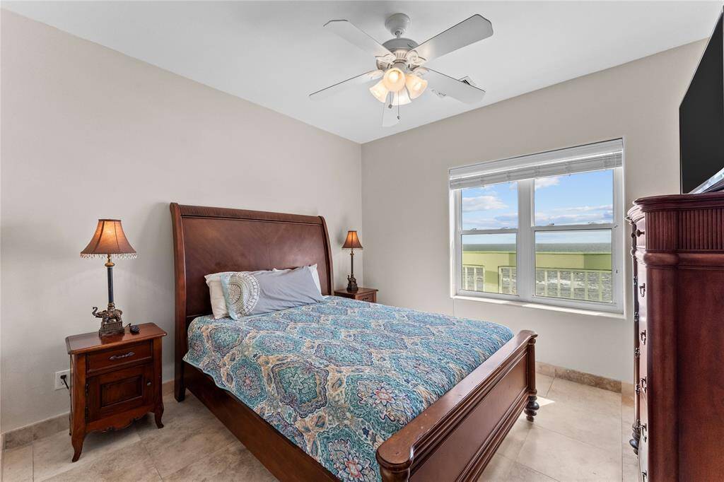 Lay in bed and watch the waves roll in from your view in the primary bedroom.