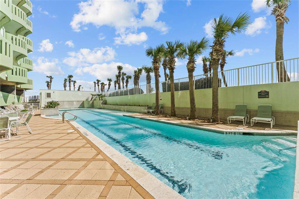 Enjoy the pool area, lap pool, wading pool, lounge chairs.