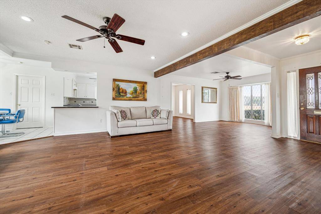 Wonderful flow from living and dining space to kitchen.