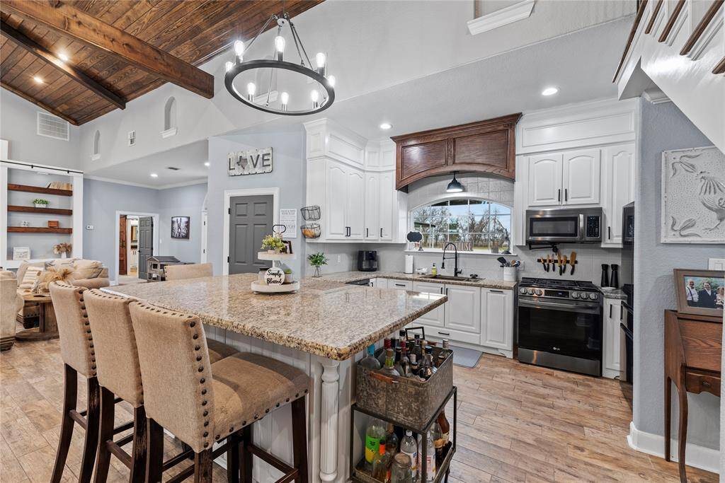 Walk in pantry and storage under the island.