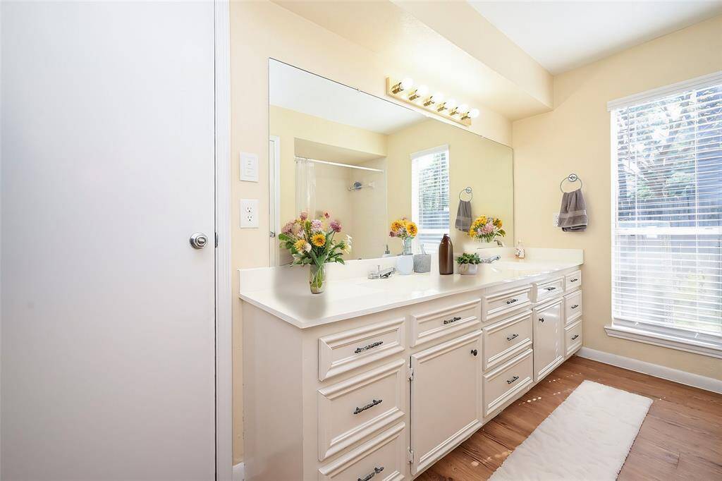 The door to the left is for the linen closet, the one in front is for the walk-in closet, and to the right is your door to the main retreat!