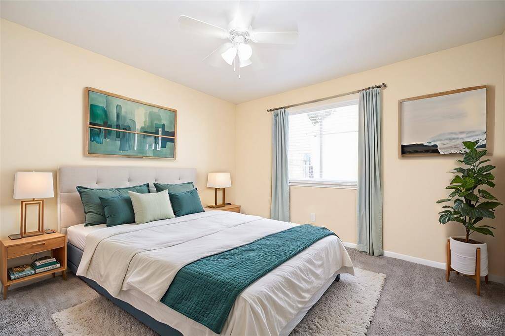 Both secondary bedrooms are equally spacious and well-appointed. Each bedroom has a ceiling fan, which offers a comfortable and energy-efficient alternative to the AC system.
