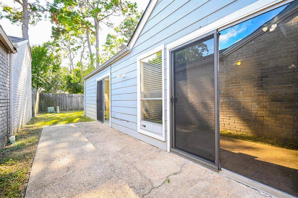 Two stunning sliding glass doors serve as exits in this space. One provides access from the living area, while the other connects to the main retreat.