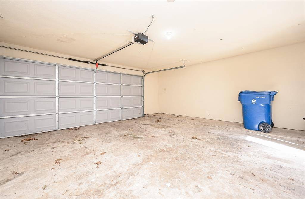 Check out the spacious two-car garage with an automatic door opener! It's perfect for your vehicles and makes parking a breeze.