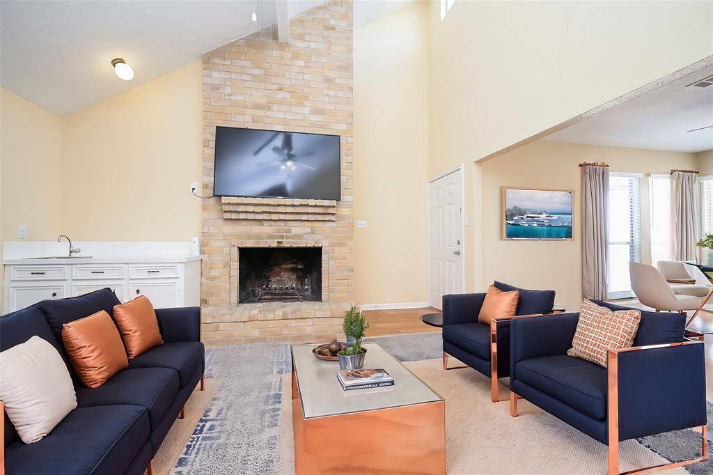 Imagine all the ways you can arrange your furniture to make this family room your own! The cozy fireplace adds the perfect finishing touch to this exceptional space!