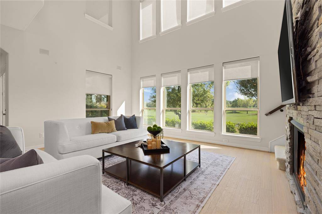 Enjoy breathtaking views of the 8th hole and spectacular sunsets from your living room.