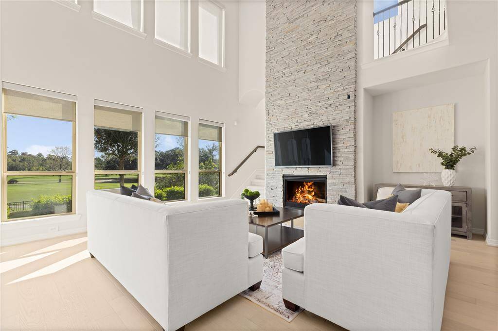 Elegant stacked stone fireplace enhancing the living space.