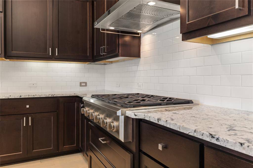 Elevate your cooking with a top-tier 6-burner gas stove and industrial vent hood.