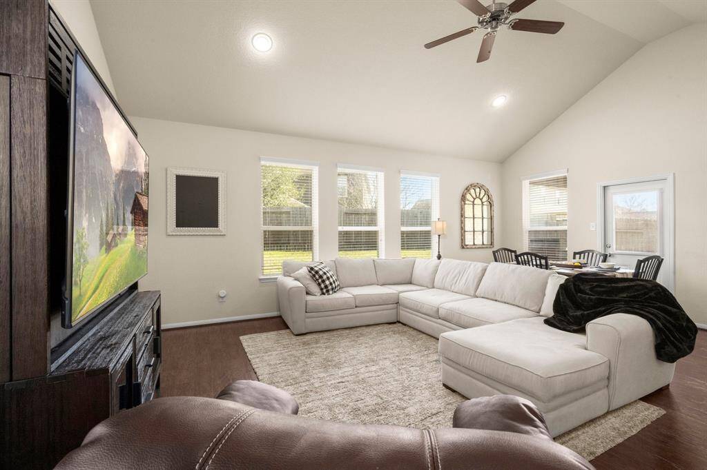 The kitchen overlooks the living room and promotes the interchange of conversation.